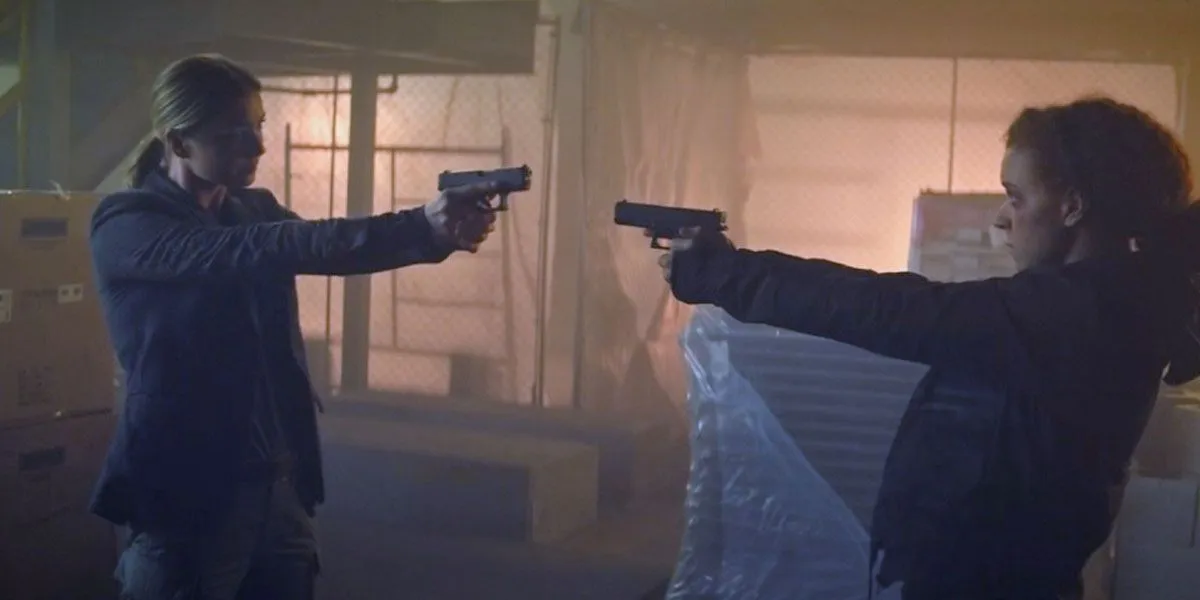 Karli and Sharon aim their guns at each other in The Falcon and the Winter Soldier.