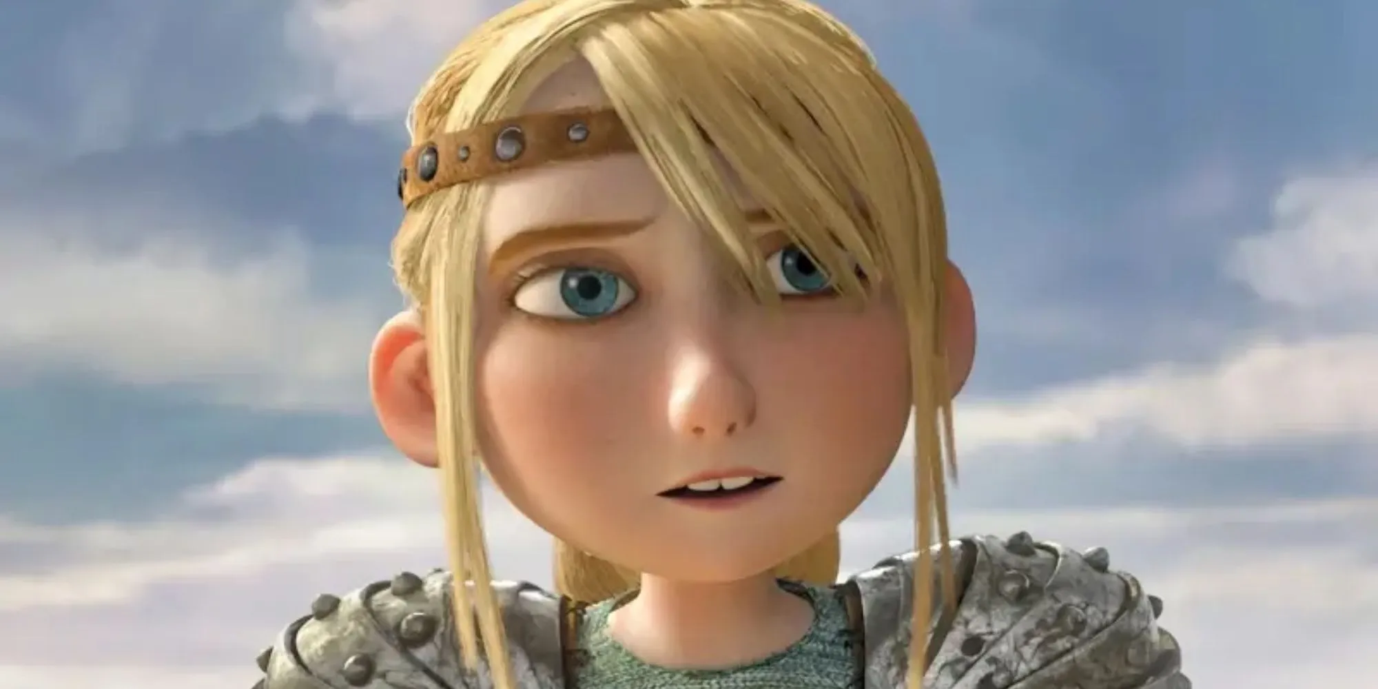 Astrid Hofferson looking on in How to Train Your Dragon with a blue sky background