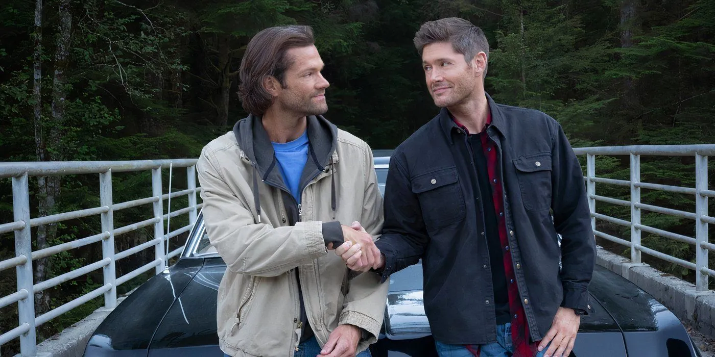 Sam and Dean shaking hands in Supernatural season 15, episode 20, Carry On